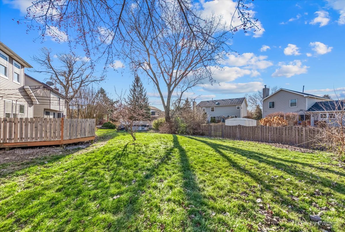 2004 Clematis Drive Algonquin, IL 60102 - Photo 41 of 44 a view of backyard with garden and deck