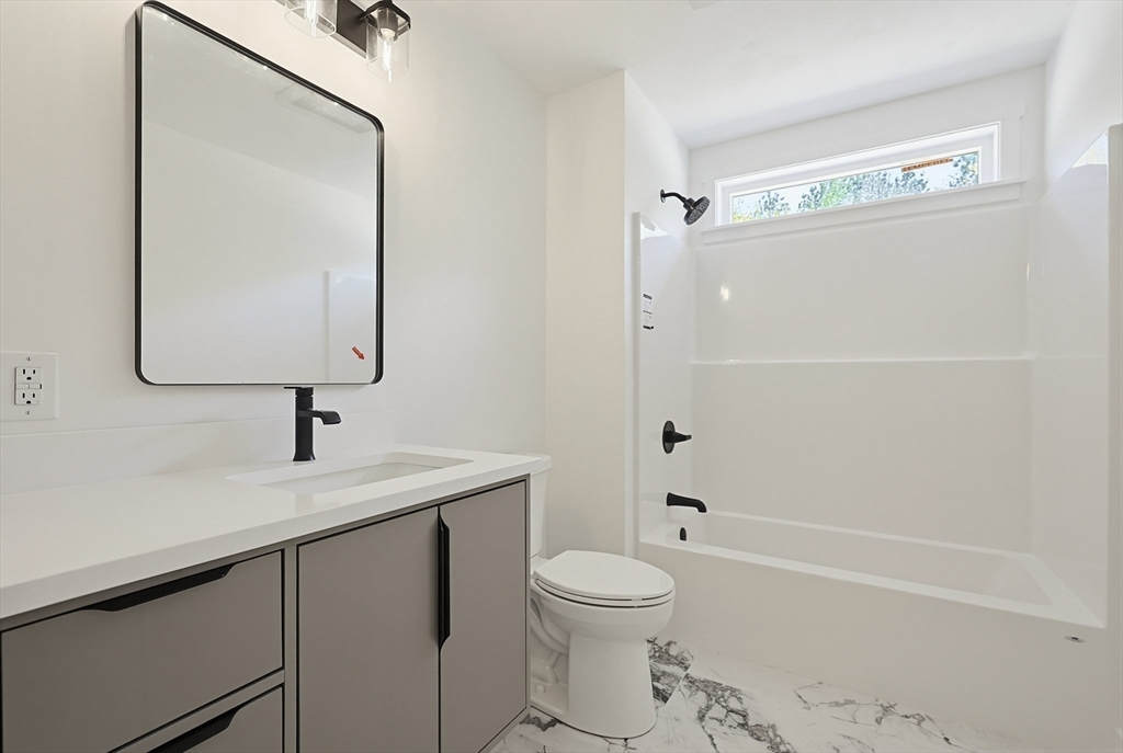 Lot 5 Pickering Road Blackstone, MA 01504 - Photo 27 of 31 a bathroom with a sink a toilet and shower