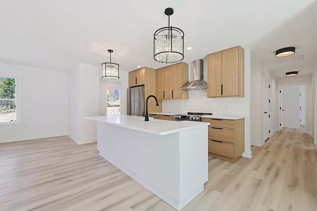 Lot 5 Pickering Road Blackstone, MA 01504 - Photo 10 of 31 a kitchen with white cabinets and sink