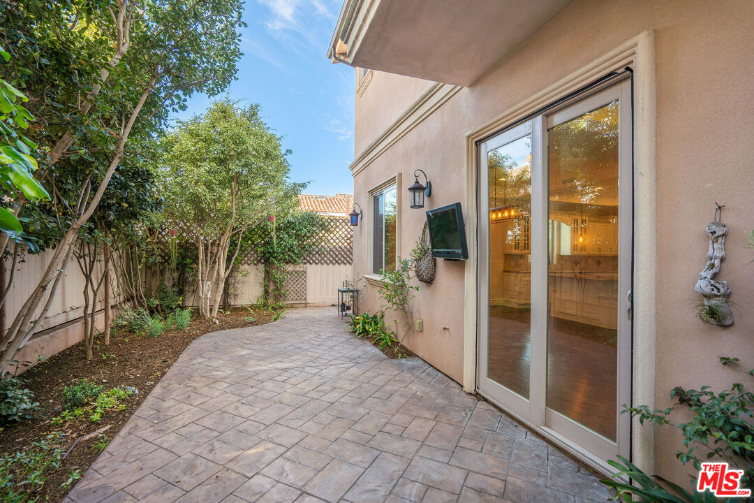 2005 Robinson Street, Unit B Redondo Beach, CA 90278 - Photo 17 of 46 a view of a house with a backyard