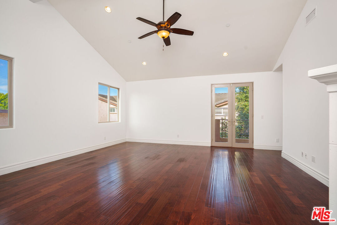 2005 Robinson Street, Unit B Redondo Beach, CA 90278 - Photo 24 of 46 an empty room with wooden floor and windows