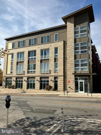 a front view of a building with street