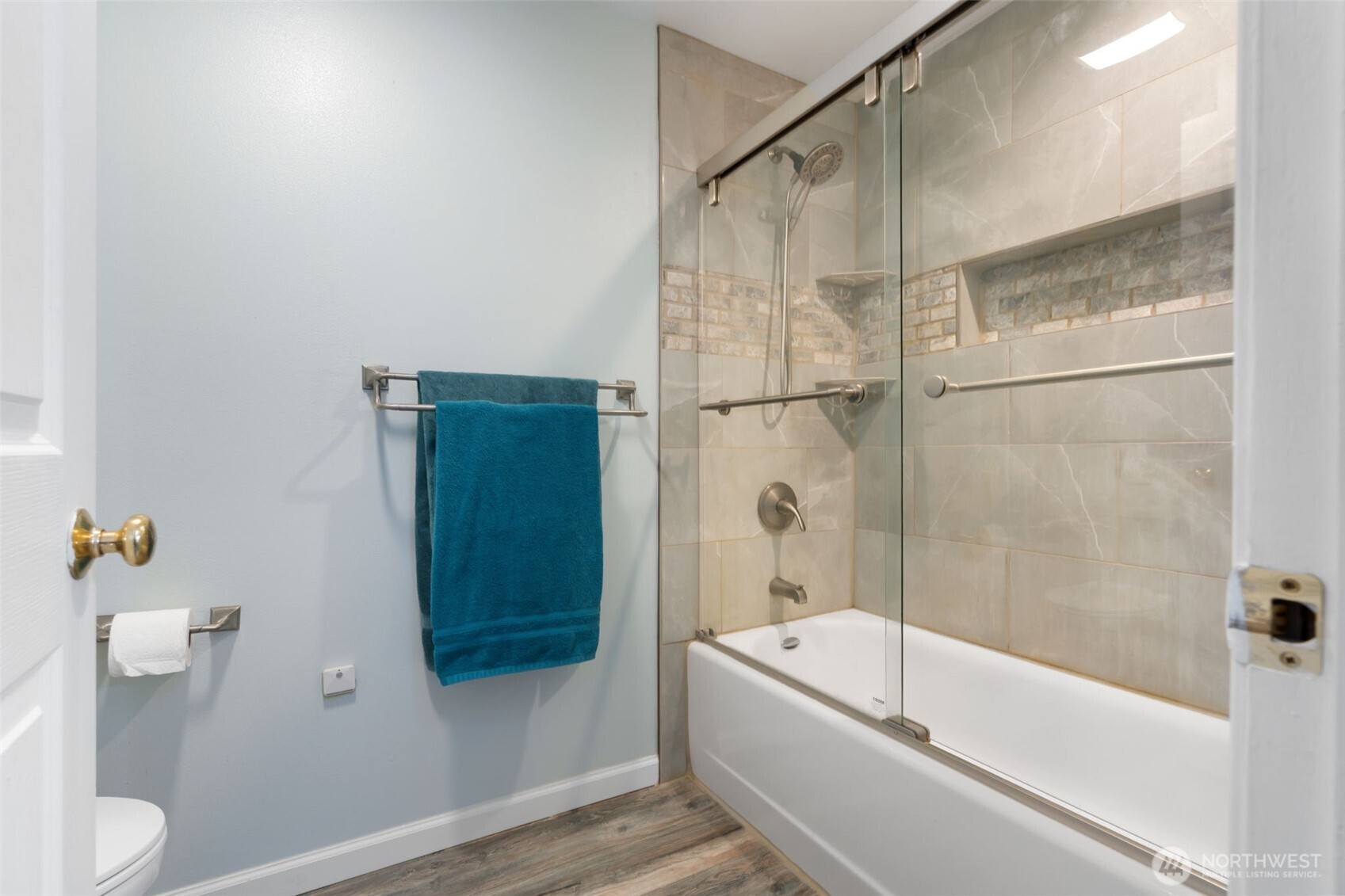 453 Coma Road Vader, WA 98593 - Photo 24 of 40 a bathroom with a bathtub and a shower