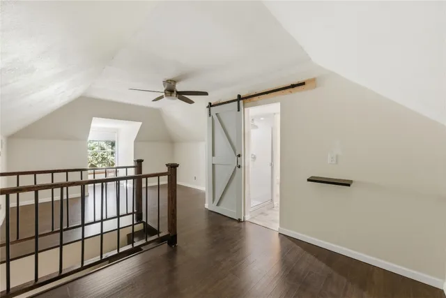 a view of a hallway with staircase