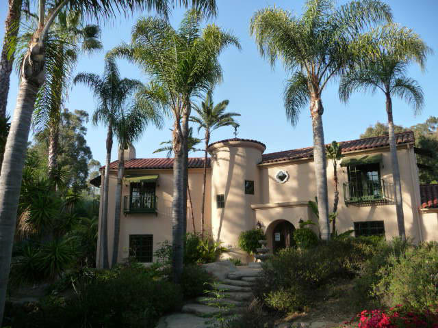 1845 Eucalyptus Hill Road Santa Barbara, CA 93108 - Photo 2 of 13 a front view of multi story residential apartment building with yard and green space