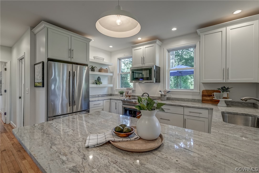 1289 Shallow Well Road Manakin-Sabot, VA 23103 - Photo 15 of 50 a kitchen with a refrigerator a sink and cabinets