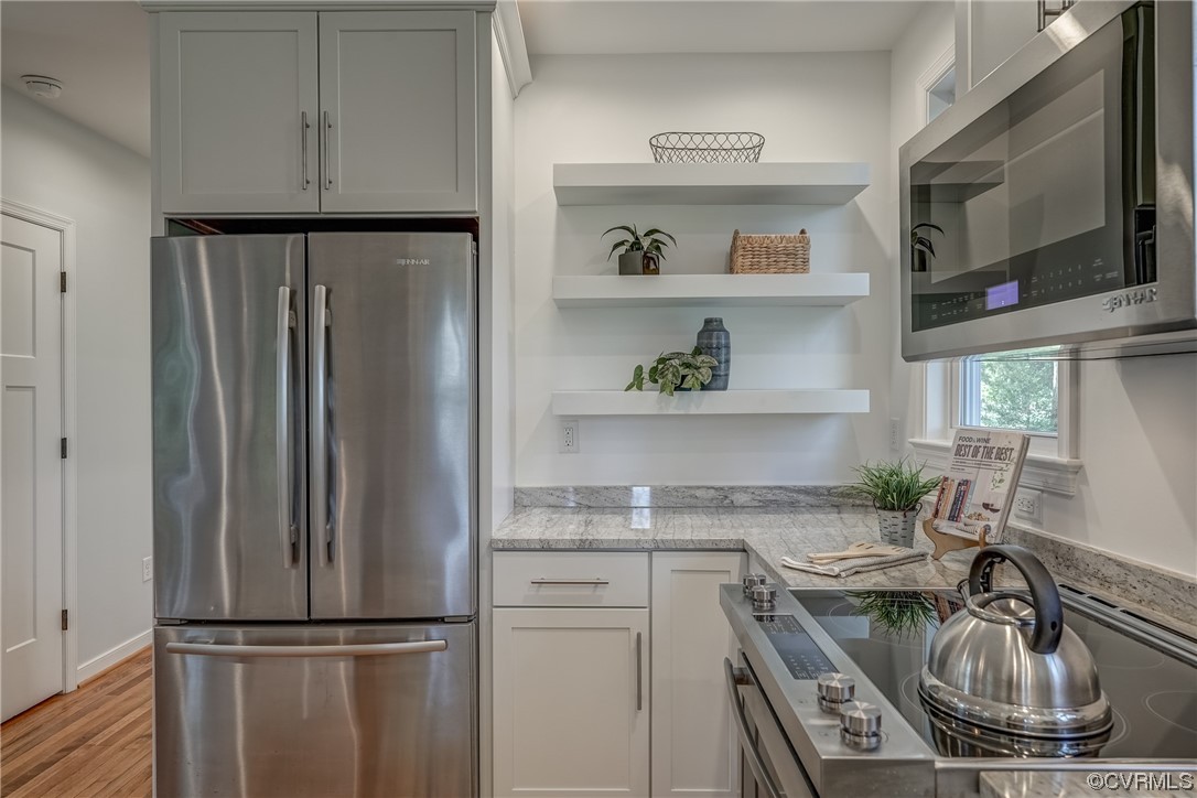 1289 Shallow Well Road Manakin-Sabot, VA 23103 - Photo 17 of 50 a kitchen with a refrigerator and a sink