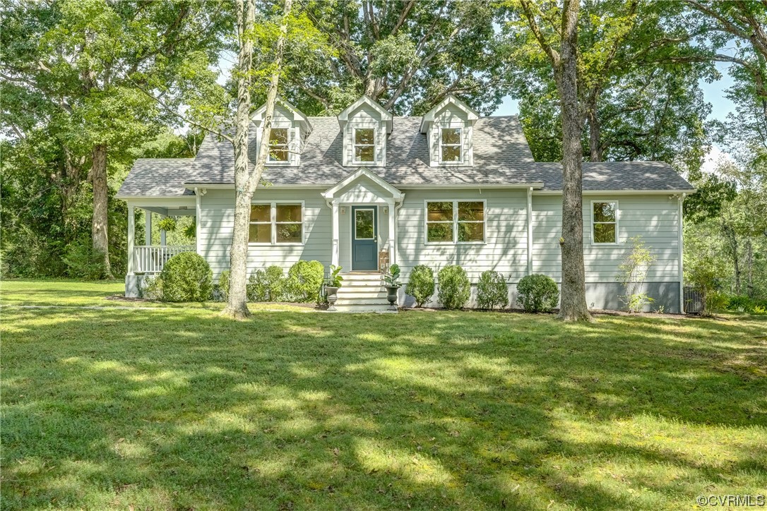 1289 Shallow Well Road Manakin-Sabot, VA 23103 - Photo 2 of 50 a front view of a house with a garden