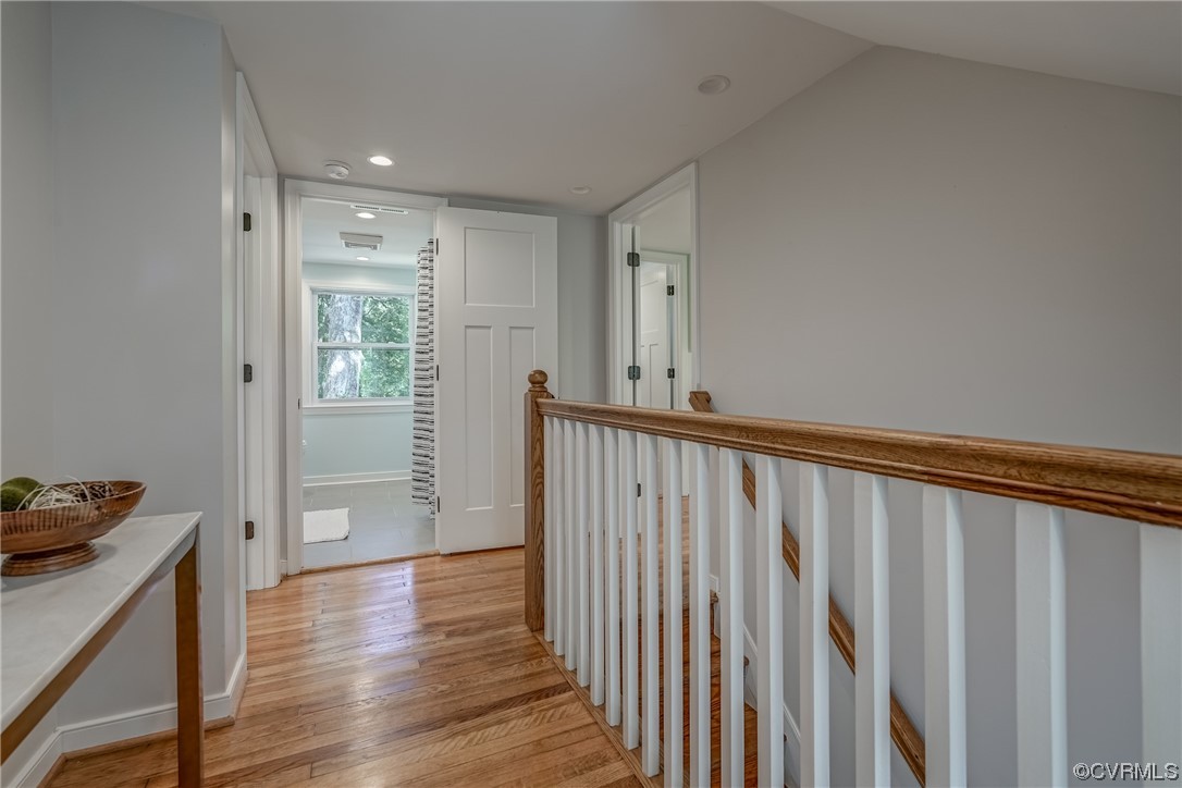 1289 Shallow Well Road Manakin-Sabot, VA 23103 - Photo 28 of 50 a view of a hallway with wooden floor and a bathroom