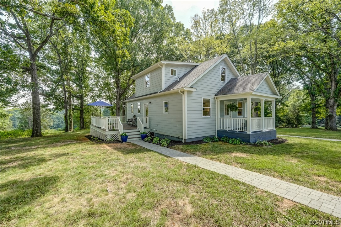 1289 Shallow Well Road Manakin-Sabot, VA 23103 - Photo 39 of 50 a view of a house with a big yard and large trees