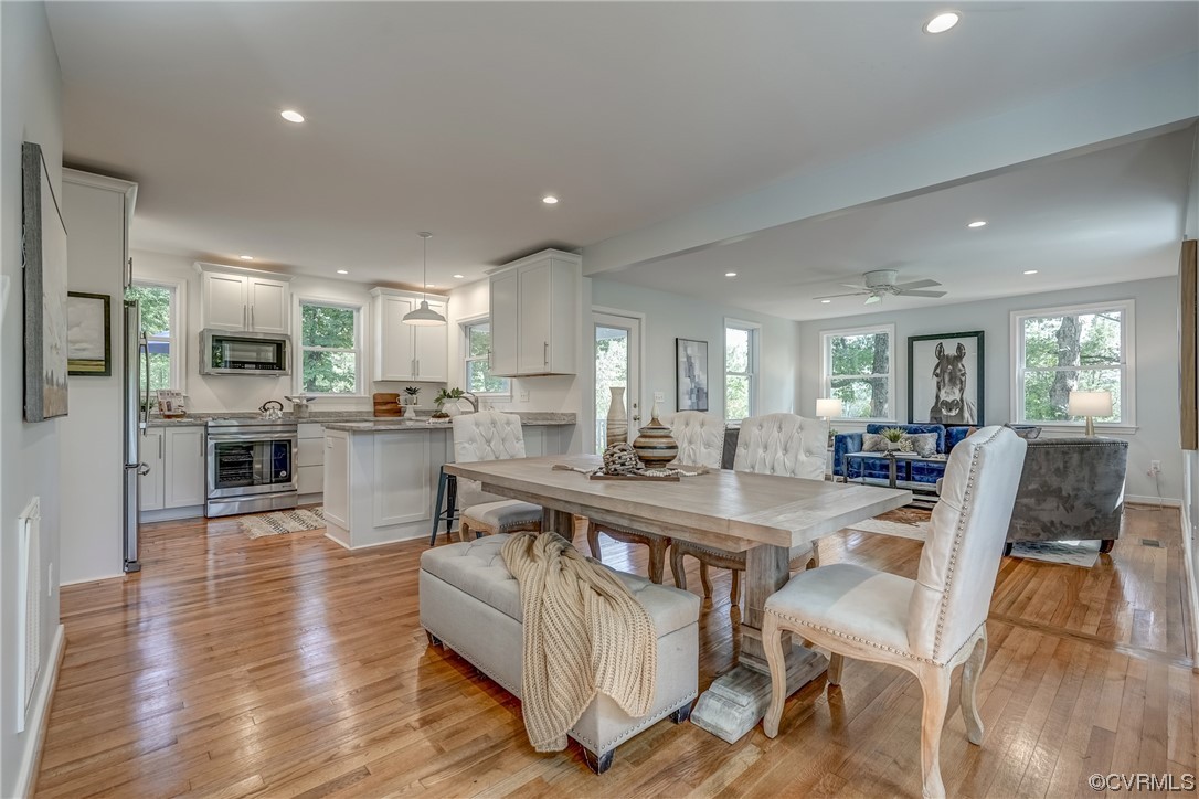 1289 Shallow Well Road Manakin-Sabot, VA 23103 - Photo 6 of 50 a view of a dining room kitchen with furniture and wooden floor