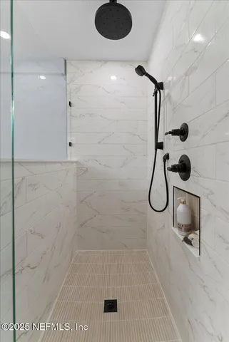 a kitchen with a refrigerator and a sink