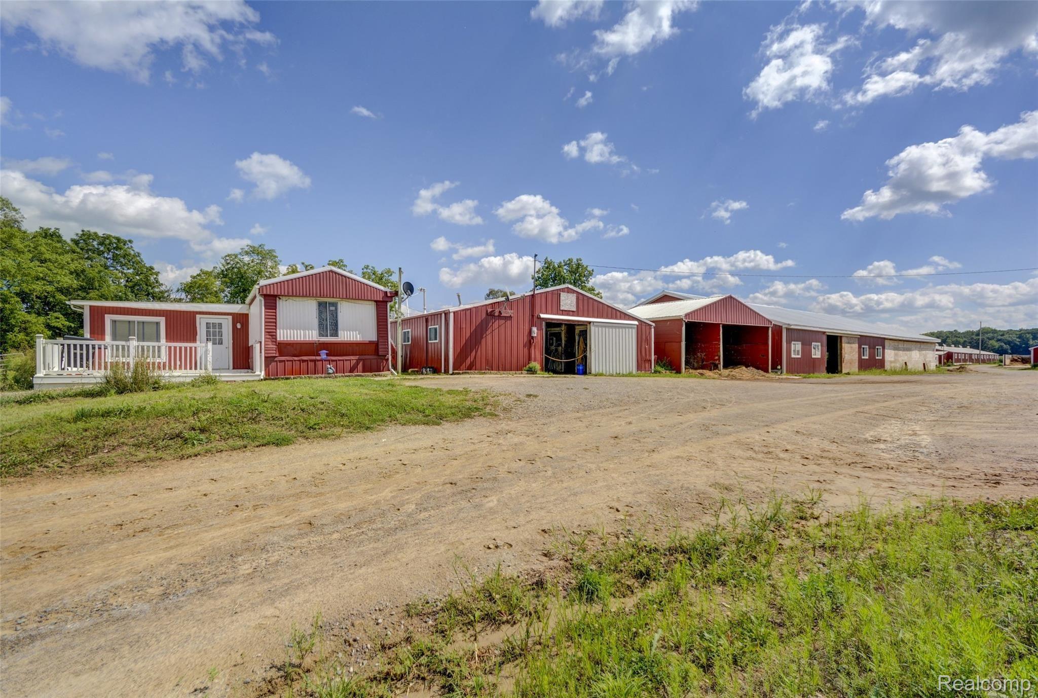 9451 East Prior Road Durand, MI 48429 - Photo 48 of 82 Back barn in middle of photo