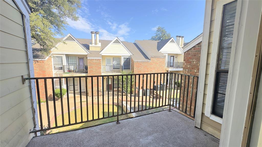 9601 Forest Lane, Unit 323 Dallas, TX 75243 - Photo 21 of 23 Balcony with a residential view