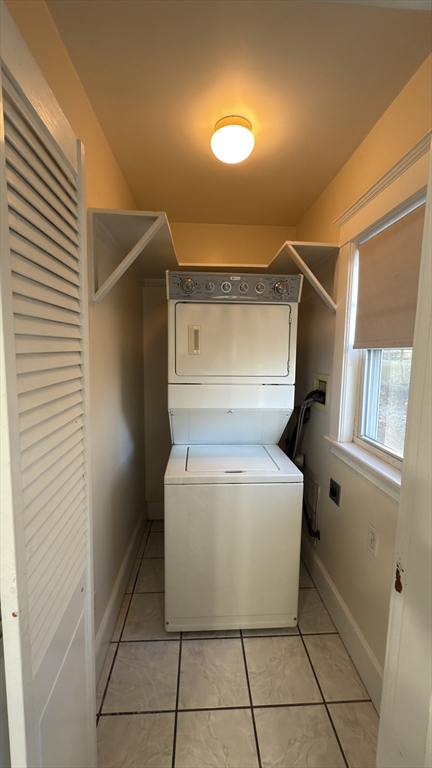 56 Union Street, Unit 2 Boston, MA 02135 - Photo 10 of 17 a view of a storage & utility room with washer and dryer