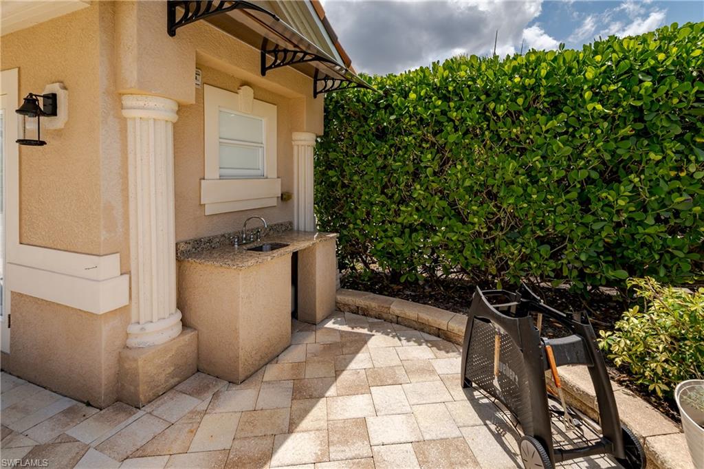 13419 Snook Circle Naples, FL 34114 - Photo 5 of 34 a view of a entryway door of the house