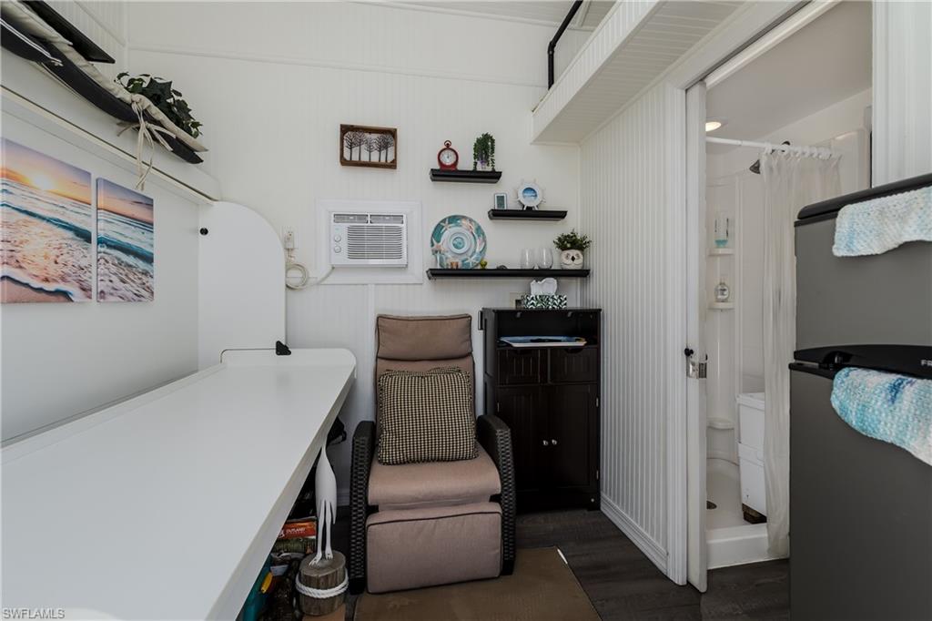 13419 Snook Circle Naples, FL 34114 - Photo 8 of 34 a bedroom with a bed and a cabinets