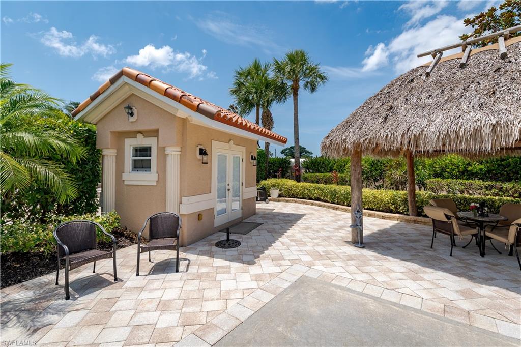 13419 Snook Circle Naples, FL 34114 - Photo 10 of 34 a house view with a outdoor space