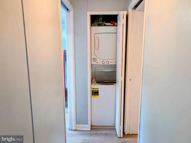 a room with a door and wooden floor