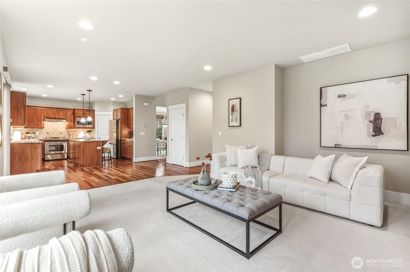 5205 Northeast 10th Street Renton, WA 98059 - Photo 12 of 28 a living room with furniture kitchen view and a large window