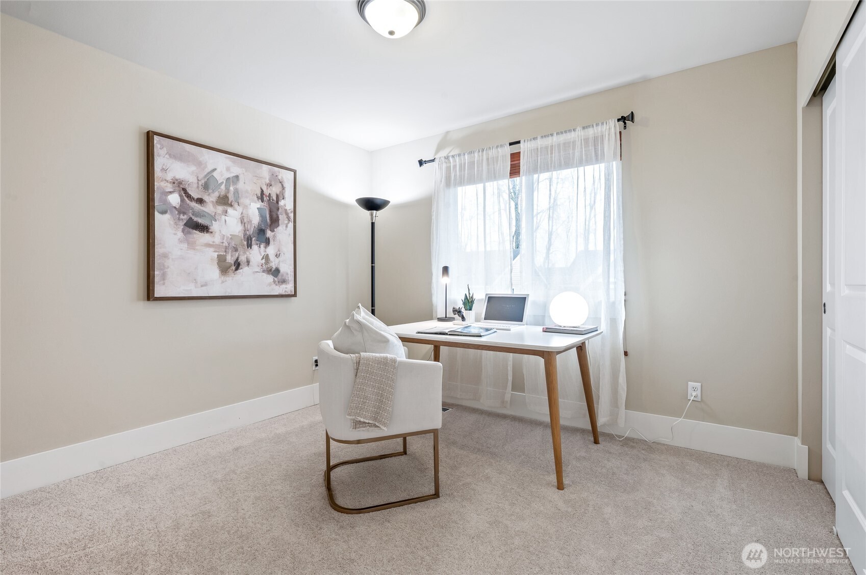 5205 Northeast 10th Street Renton, WA 98059 - Photo 22 of 28 a workspace with furniture and window