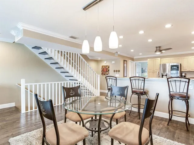 a living room with fireplace furniture and a flat screen tv