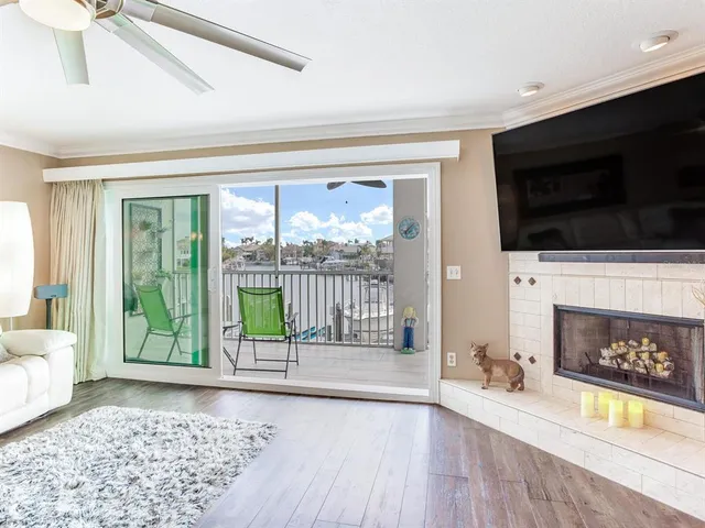 a view of a porch with furniture and a yard
