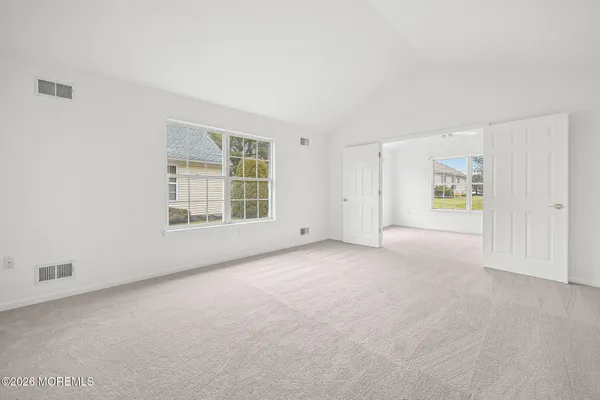 an empty room with windows