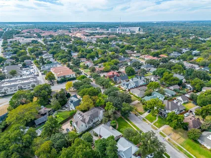 an aerial view of a city with lots of residential buildings