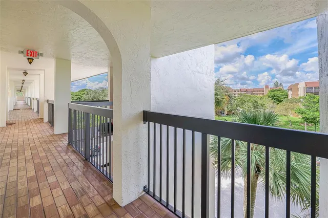 a view of a swimming pool with a lounge chairs