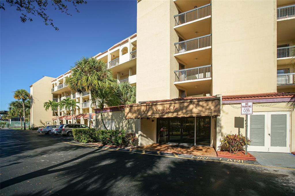 3650 Environ Boulevard, Unit 401 Lauderhill, FL 33319 - Photo 41 of 59 a front view of a building with street view