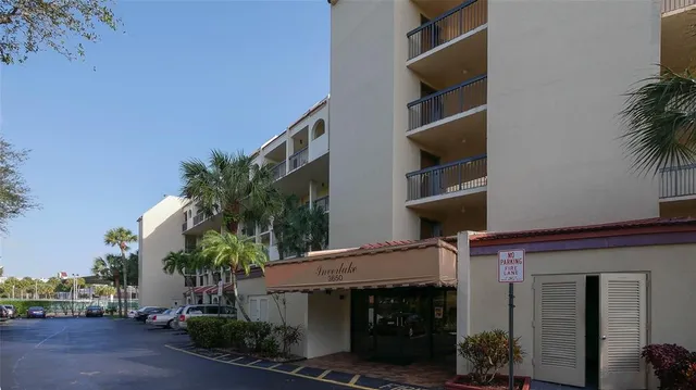 a view of a swimming pool and a yard