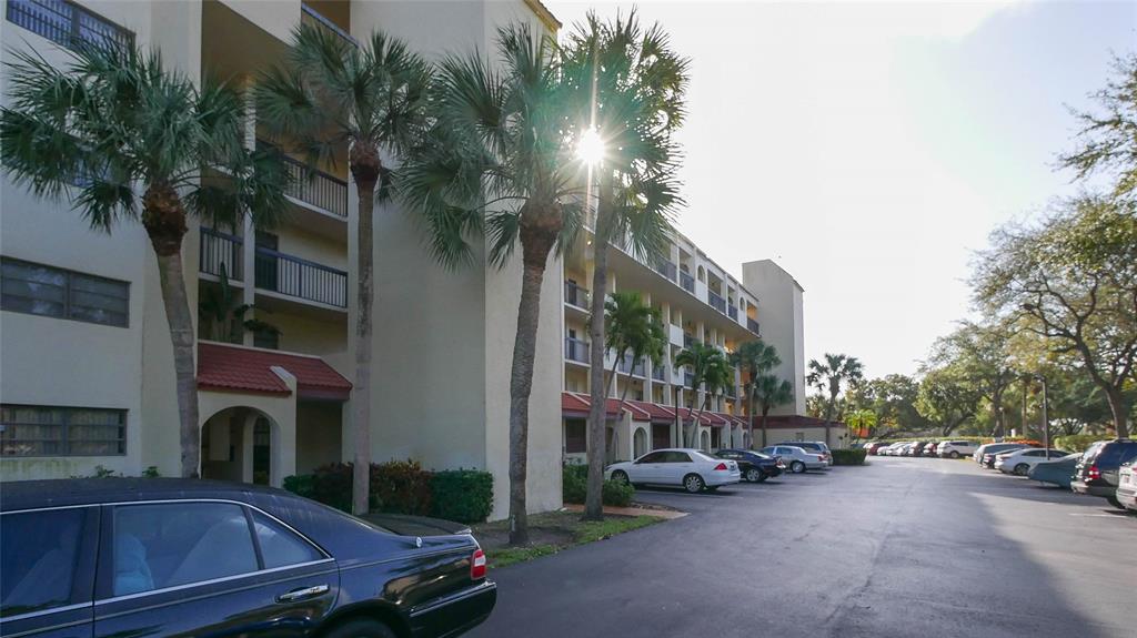 3650 Environ Boulevard, Unit 401 Lauderhill, FL 33319 - Photo 46 of 59 a view of a street with cars