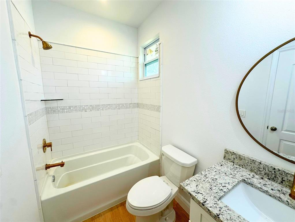 8297 Strasse Boulevard Punta Gorda, FL 33982 - Photo 13 of 31 a bathroom with a sink and a mirror