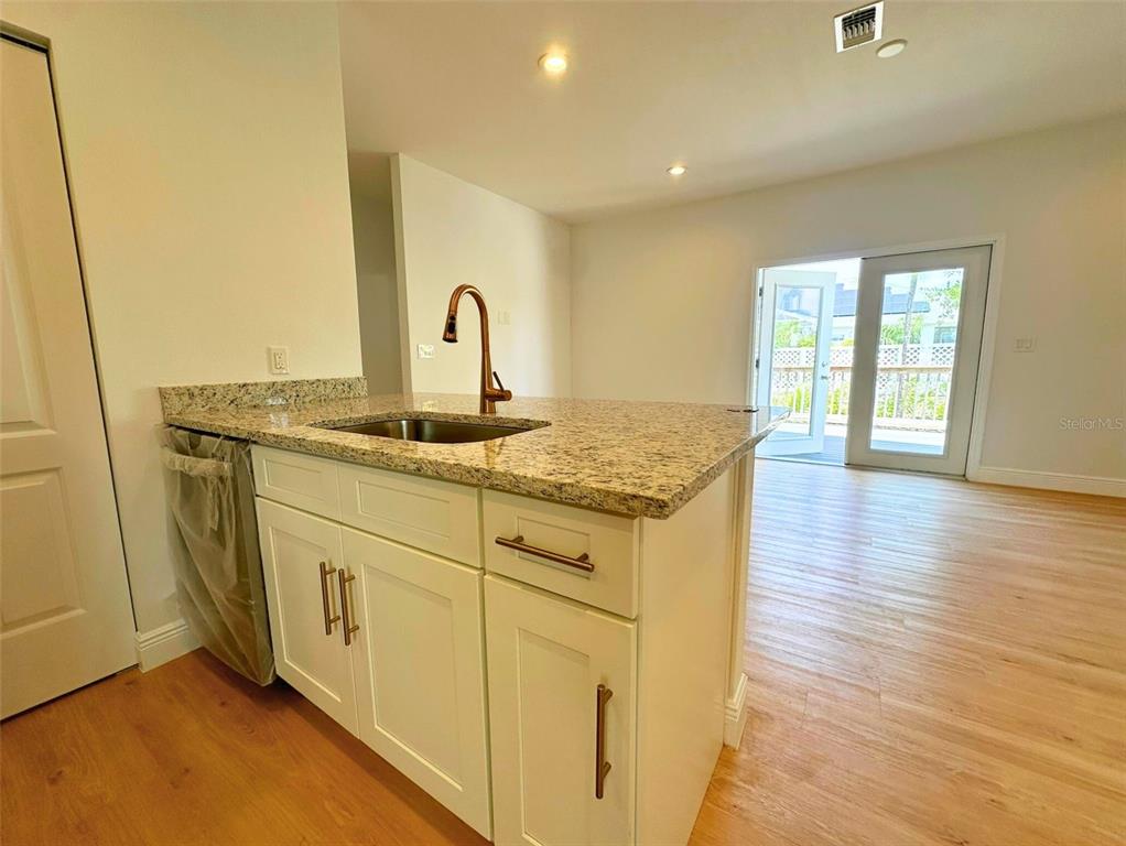 8297 Strasse Boulevard Punta Gorda, FL 33982 - Photo 24 of 31 a kitchen with sink and cabinets