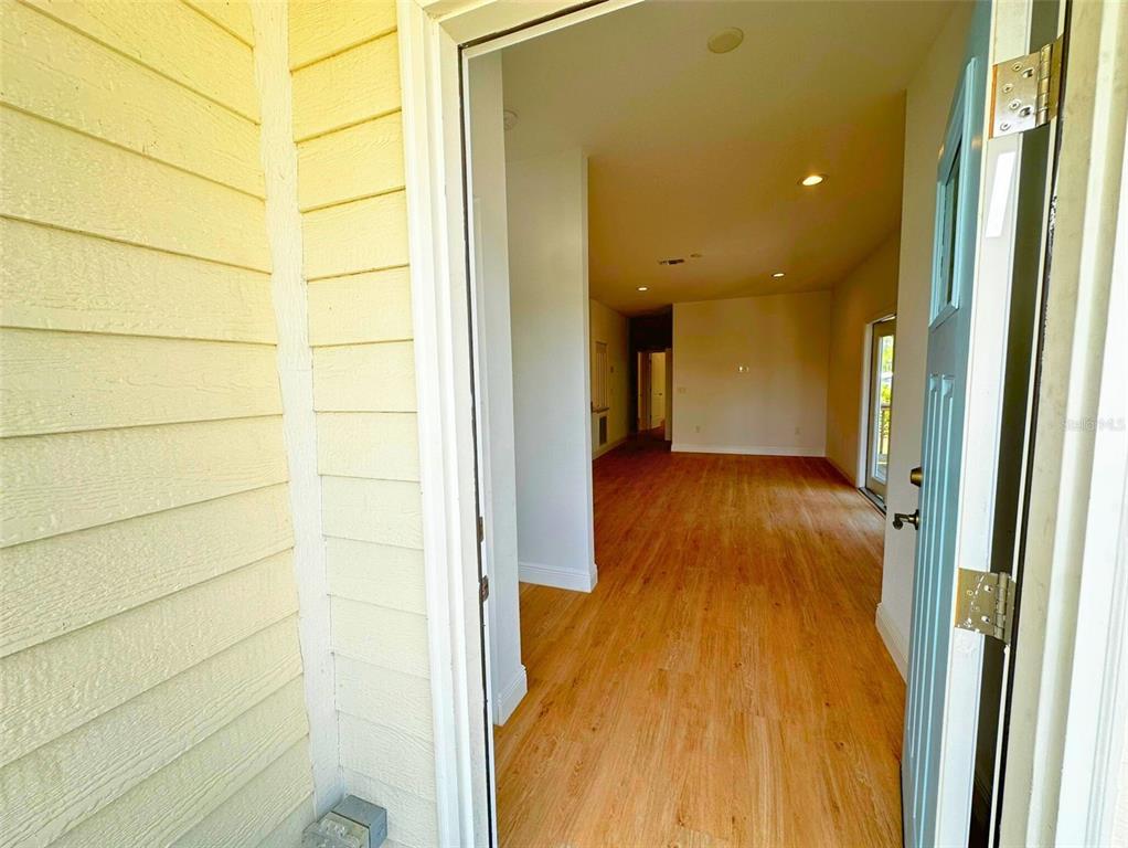 8297 Strasse Boulevard Punta Gorda, FL 33982 - Photo 29 of 31 a view of a hallway with wooden floor