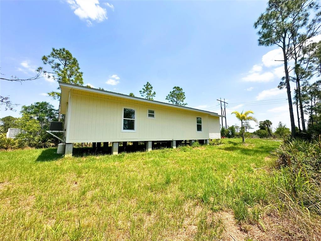 8297 Strasse Boulevard Punta Gorda, FL 33982 - Photo 31 of 31 a outdoor view with patio