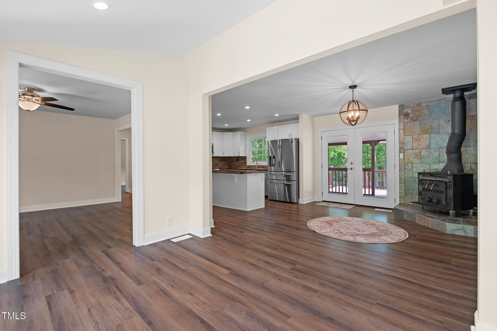 35 Fire Tower Drive Rougemont, NC 27572 - Photo 27 of 72 a view of a kitchen with wooden floor and a refrigerator