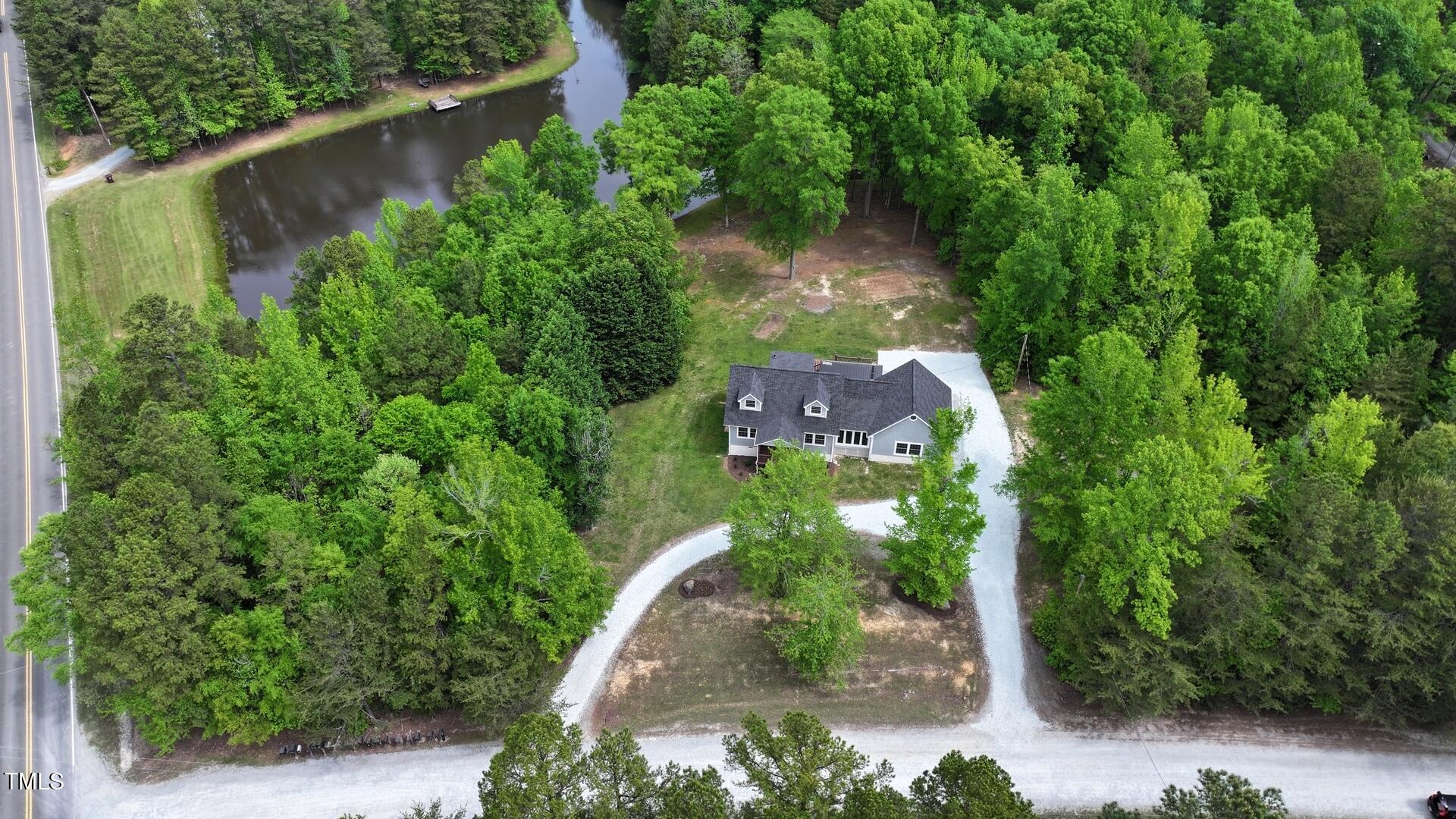 35 Fire Tower Drive Rougemont, NC 27572 - Photo 65 of 72 an aerial view of residential house with outdoor space and trees all around