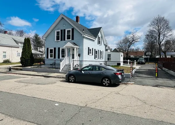 a car parked in front of a house