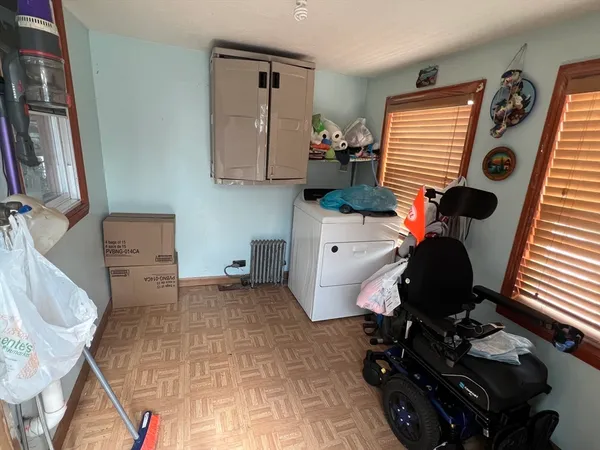 a room with furniture and a window