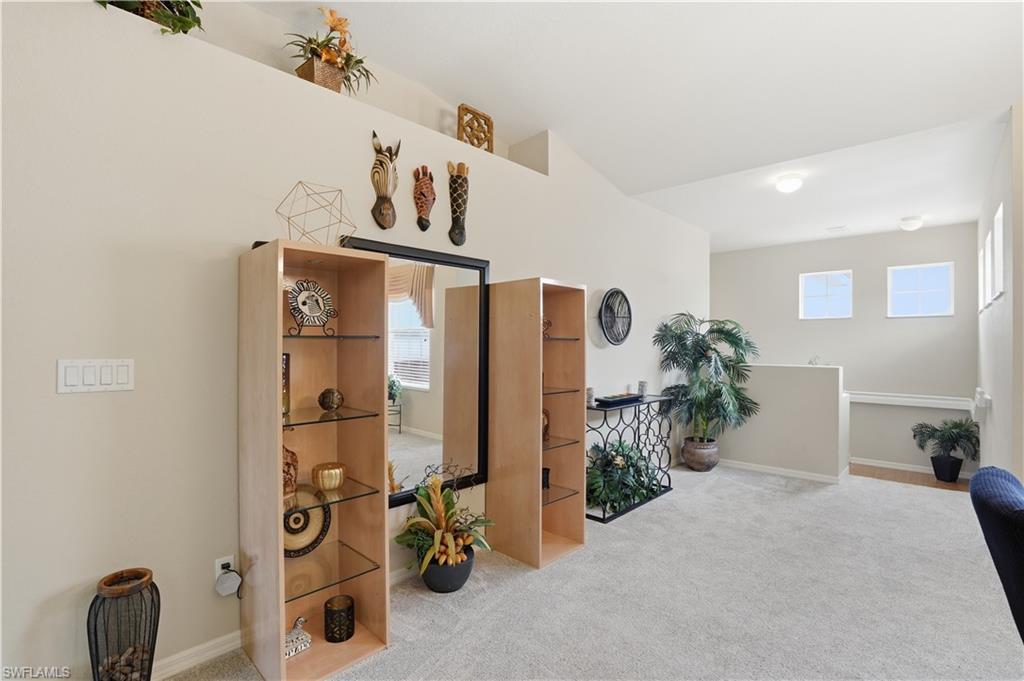 10871 Crooked River Road, Unit 202 Estero, FL 34135 - Photo 7 of 46 a view of entryway with livingroom and window