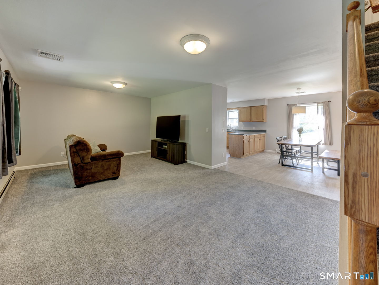 212 South Bedlam Road Mansfield, CT 06250 - Photo 3 of 40 Living room opens to dining area and kitchen.