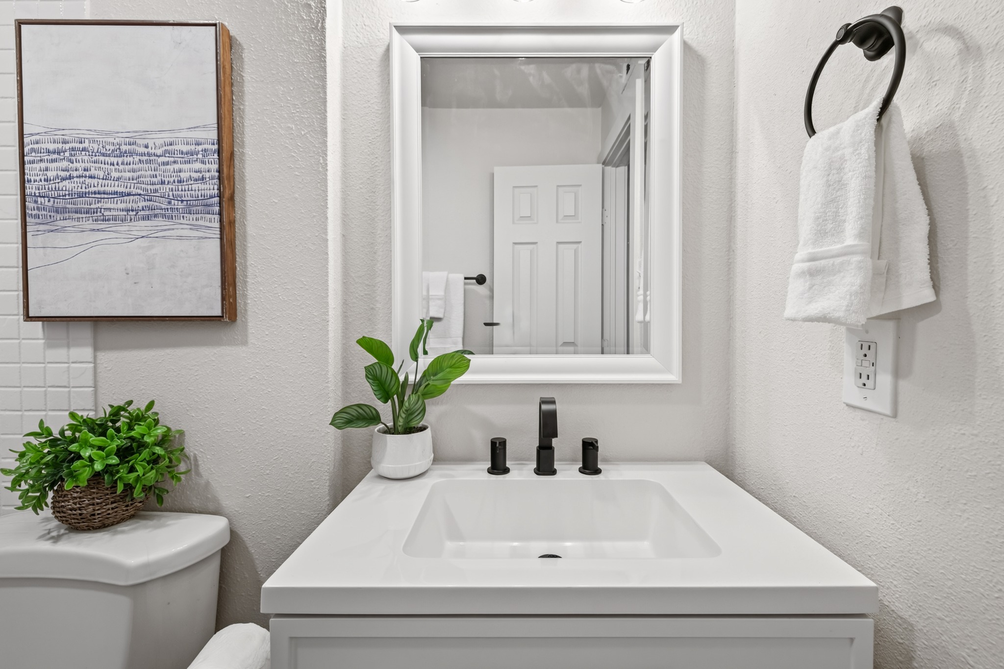 2000 Lightsey Road, Unit 5 Austin, TX 78704 - Photo 16 of 24 The fresh paint extends into the bathroom, making the space feel renewed