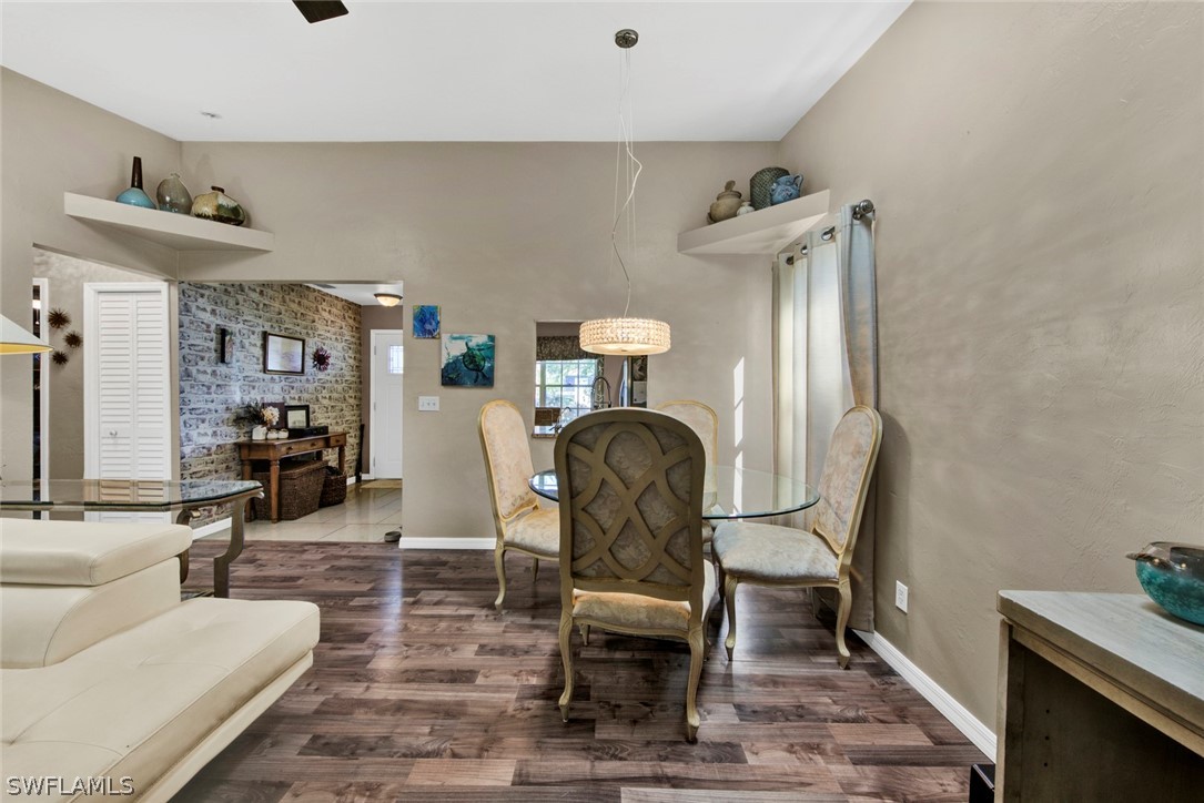 18442 Sunflower Road Fort Myers, FL 33967 - Photo 13 of 26 a living room with furniture and a table