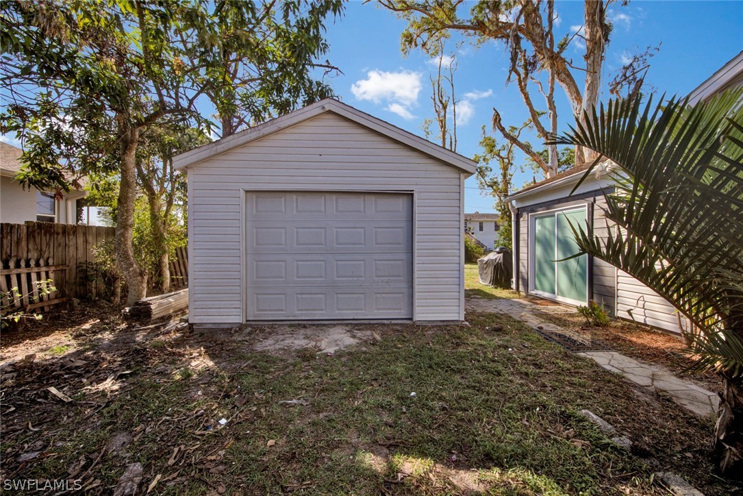 18442 Sunflower Road Fort Myers, FL 33967 - Photo 24 of 26 a view of a house with a yard