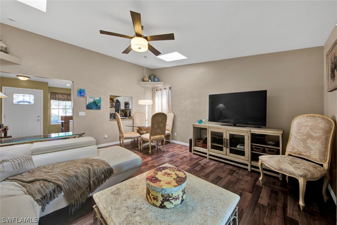 18442 Sunflower Road Fort Myers, FL 33967 - Photo 10 of 26 a living room with furniture and a flat screen tv