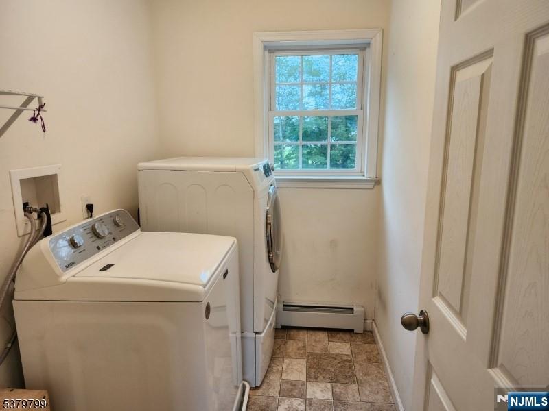 128 Big Piece Road Fairfield, NJ 07004 - Photo 11 of 26 a utility room with dryer and washer