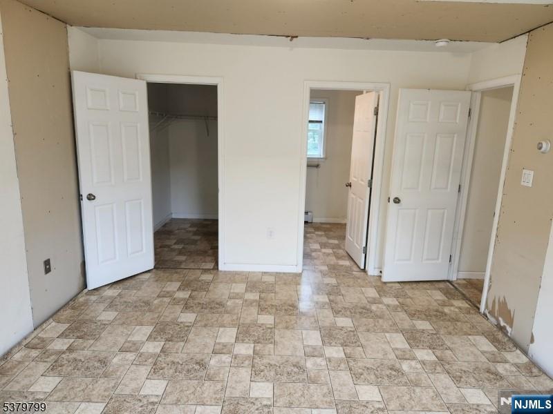 128 Big Piece Road Fairfield, NJ 07004 - Photo 12 of 26 a view of a bathroom with a sink
