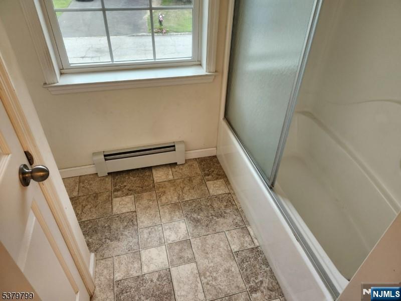 128 Big Piece Road Fairfield, NJ 07004 - Photo 10 of 26 a view of a bathroom with a sink